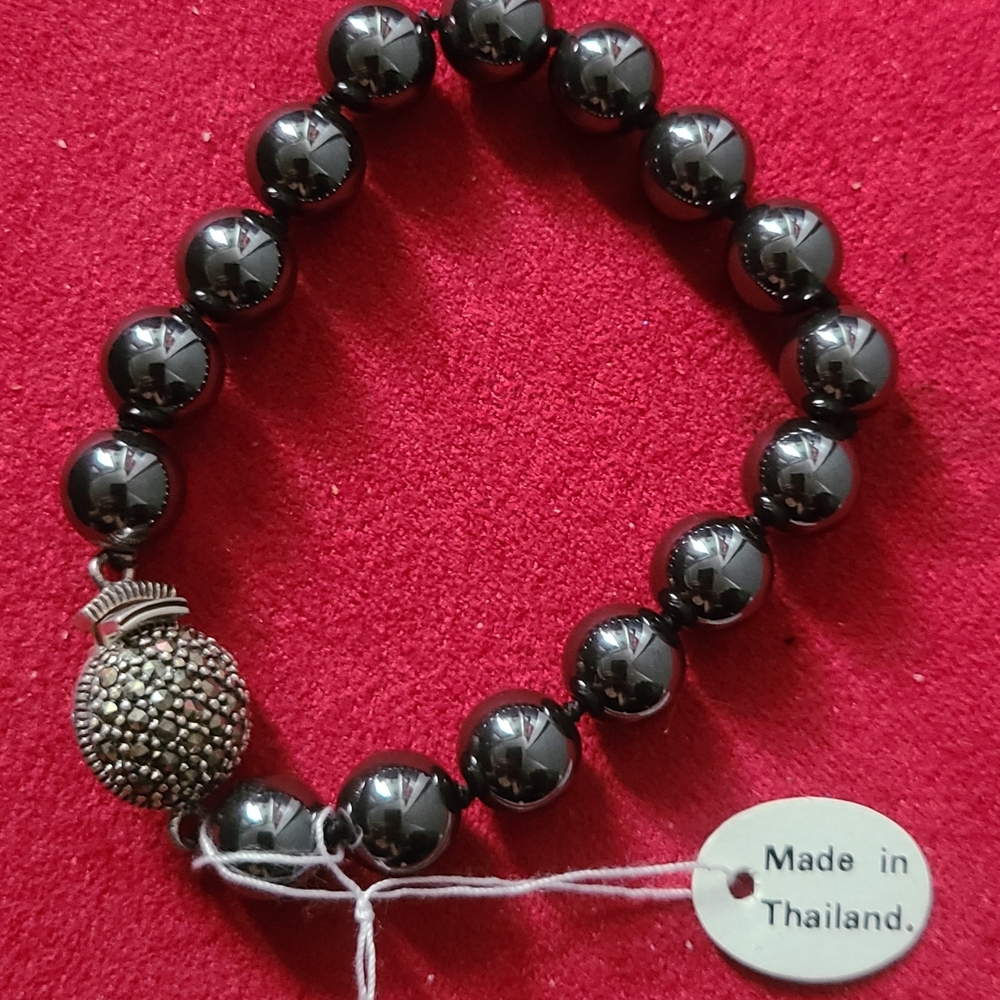 Black Tahitian Pearl And Spinal Bracelet with Silver Accent